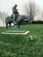 This Cowboy stands outside of the Booth Museum, hat in hand!