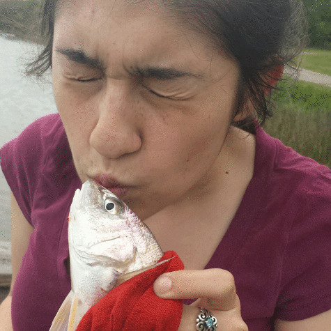 Cheyenne kissing the frog.
